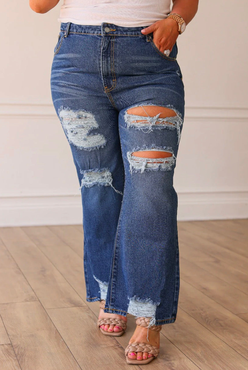 The Blake Med-Washed Mid Rise Distressed Crop Flare