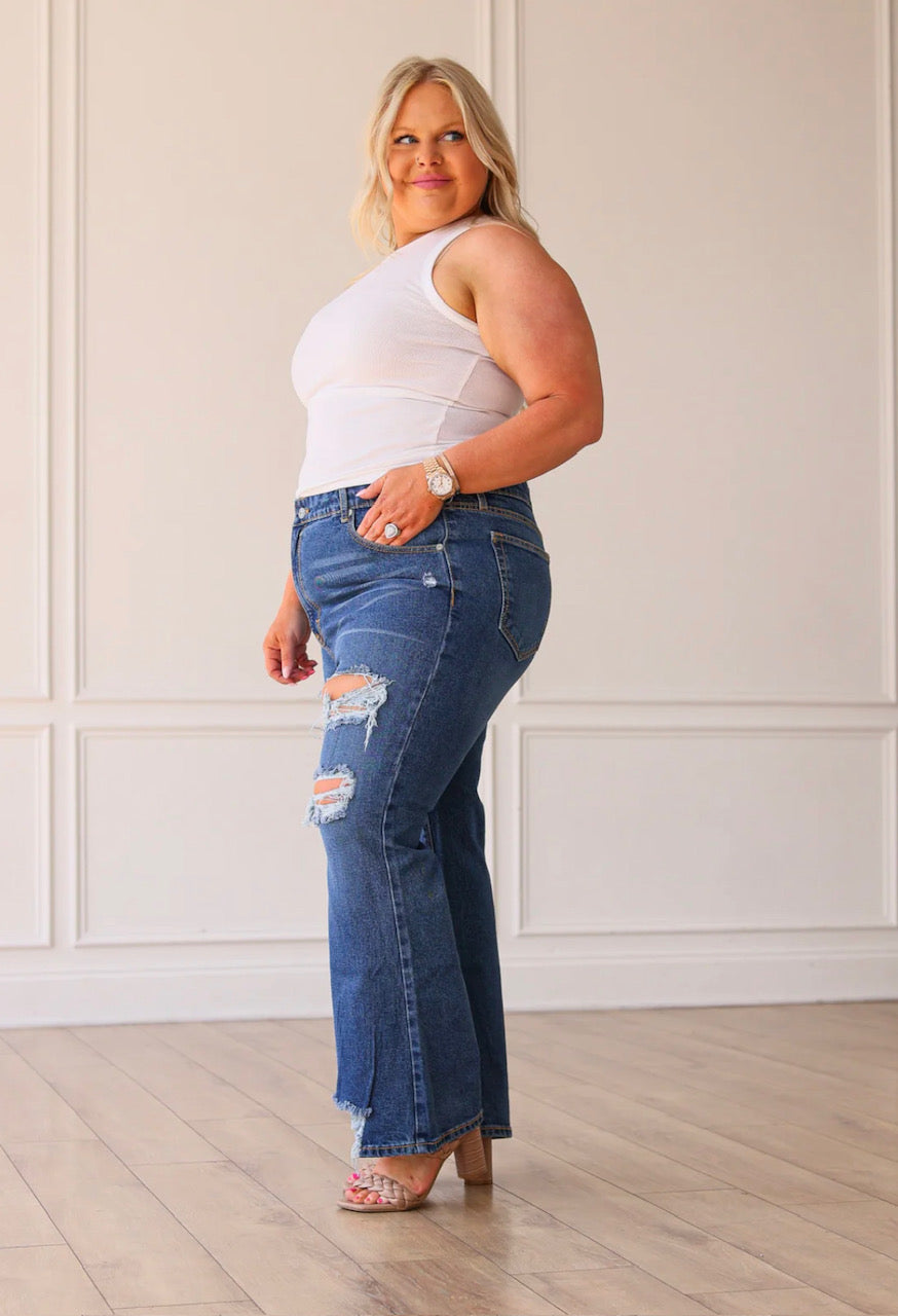 The Blake Med-Washed Mid Rise Distressed Crop Flare